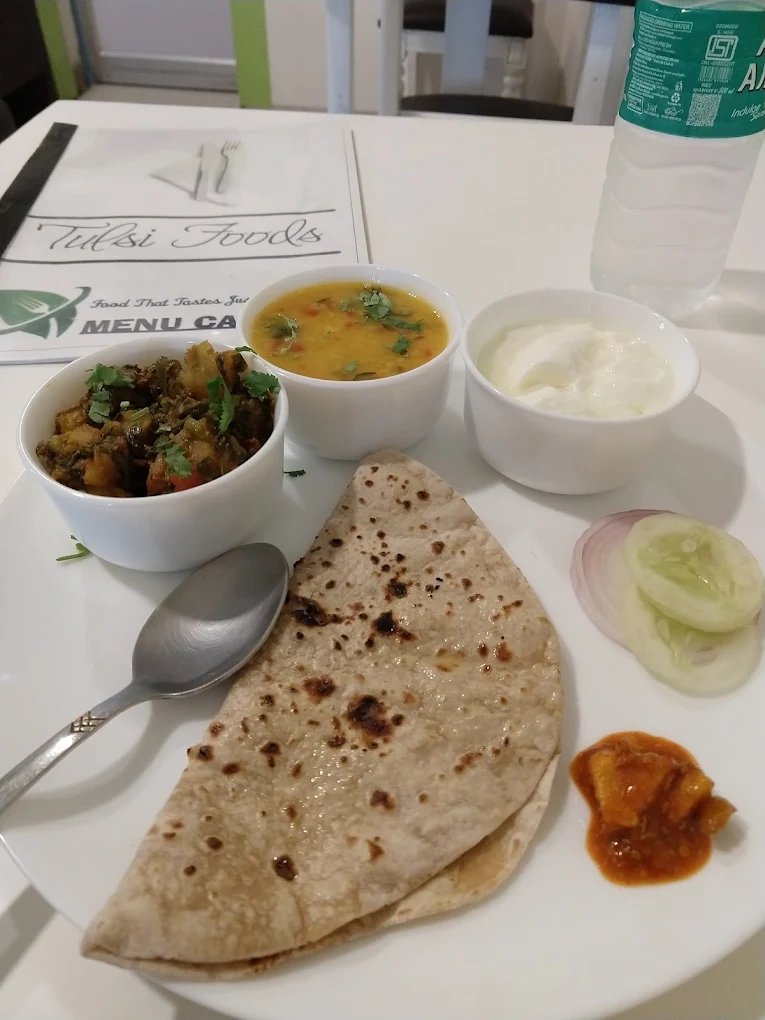 A Tulsi Foods thali with roti, sabzi, dal and curd
